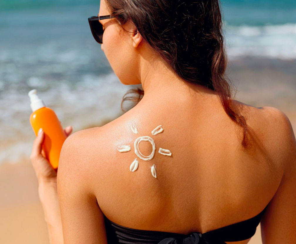 rostro con crema solar